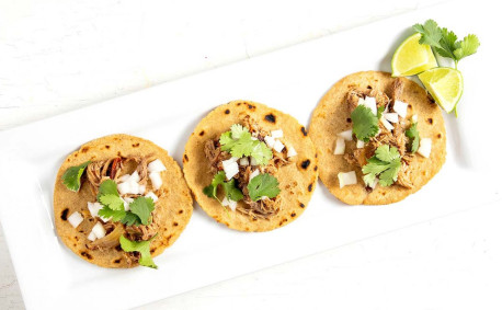 Pork and sorghum street tacos