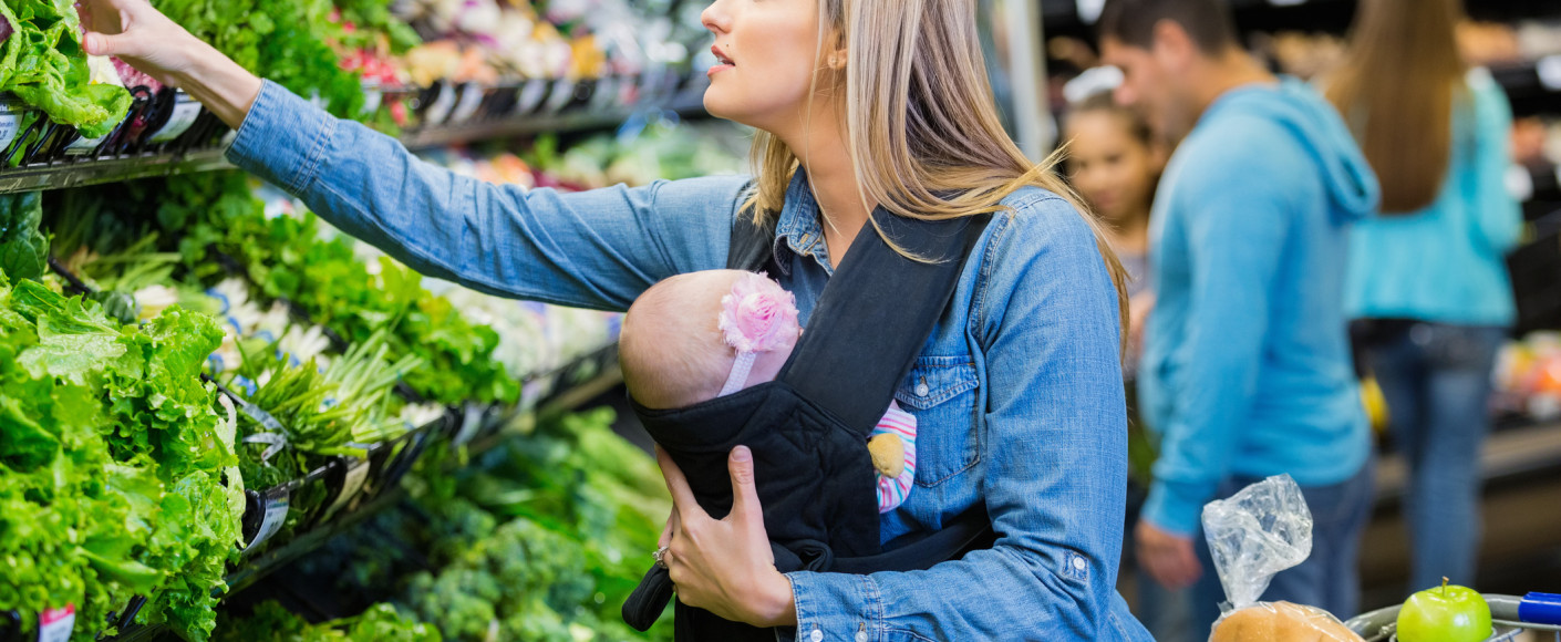 mom and baby buying vegetables mom and baby buying vegetables